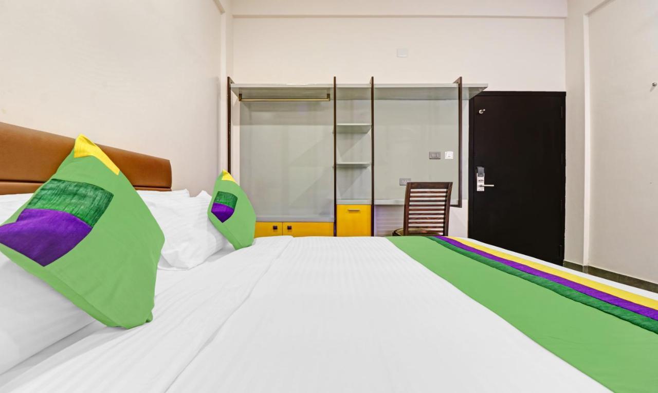 Treebo Grand Vistara Airport Suites Kochi Exterior foto
