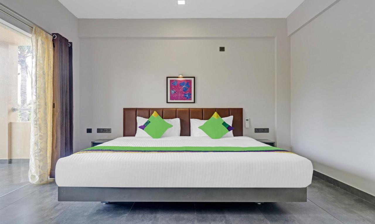 Treebo Grand Vistara Airport Suites Kochi Exterior foto