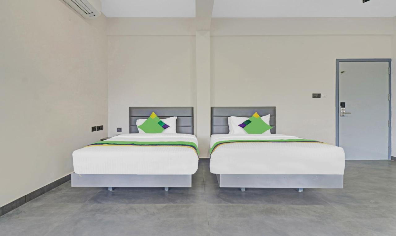 Treebo Grand Vistara Airport Suites Kochi Exterior foto