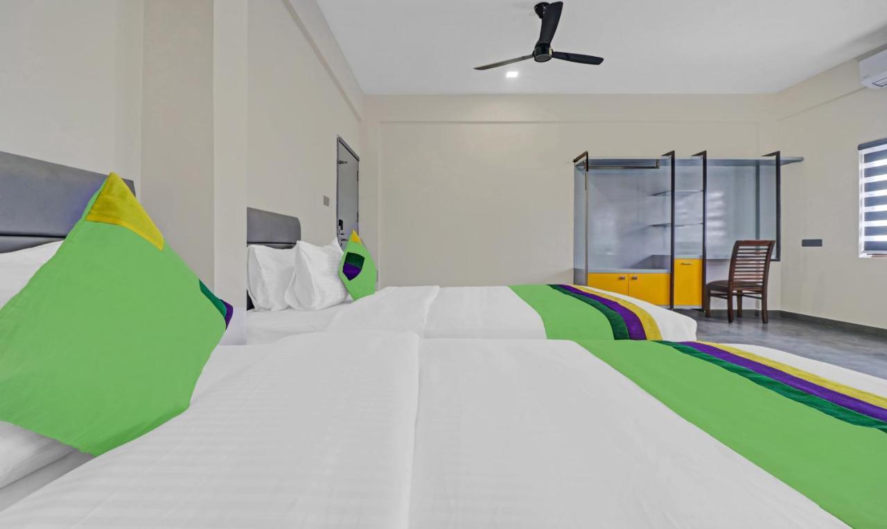 Treebo Grand Vistara Airport Suites Kochi Exterior foto