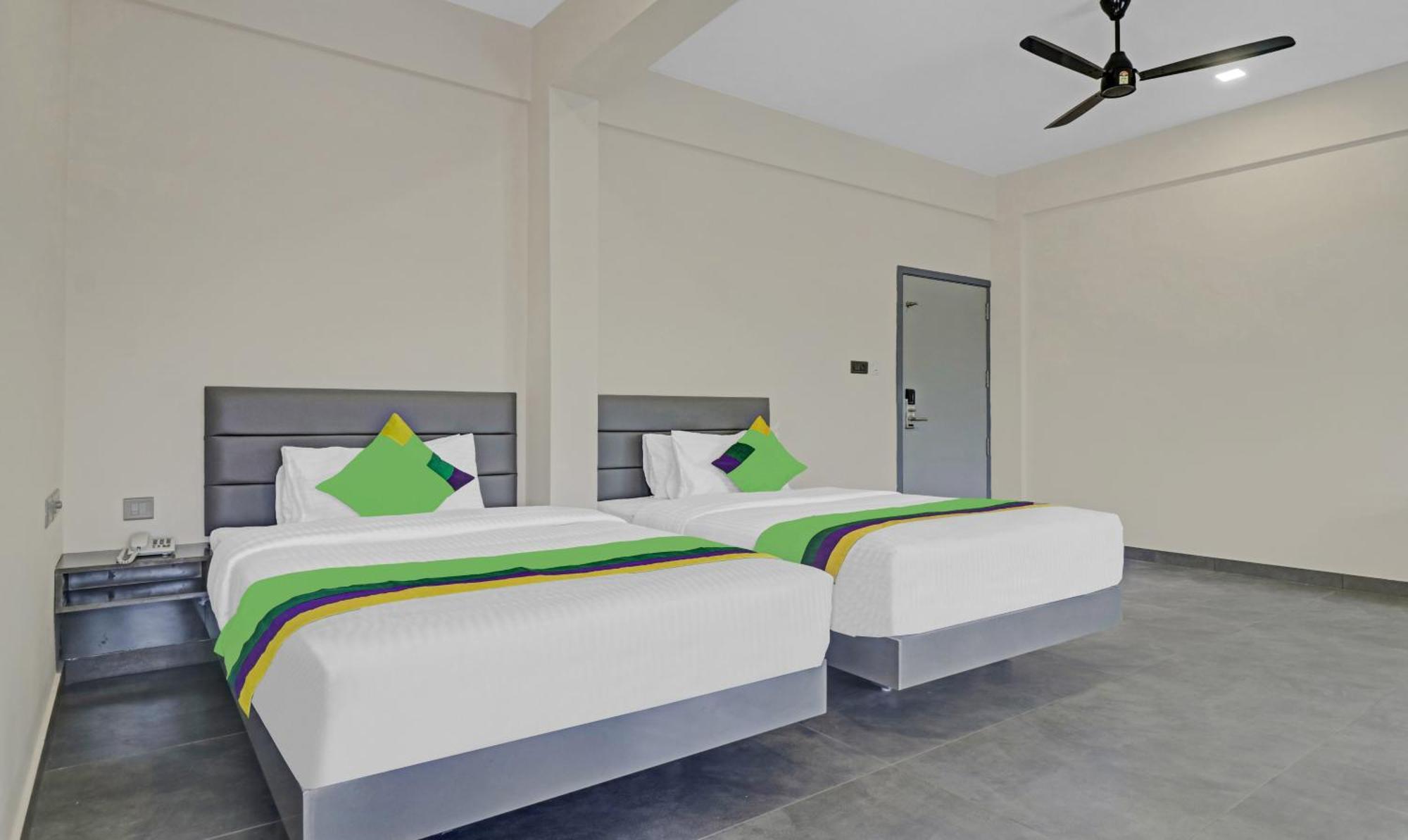 Treebo Grand Vistara Airport Suites Kochi Exterior foto