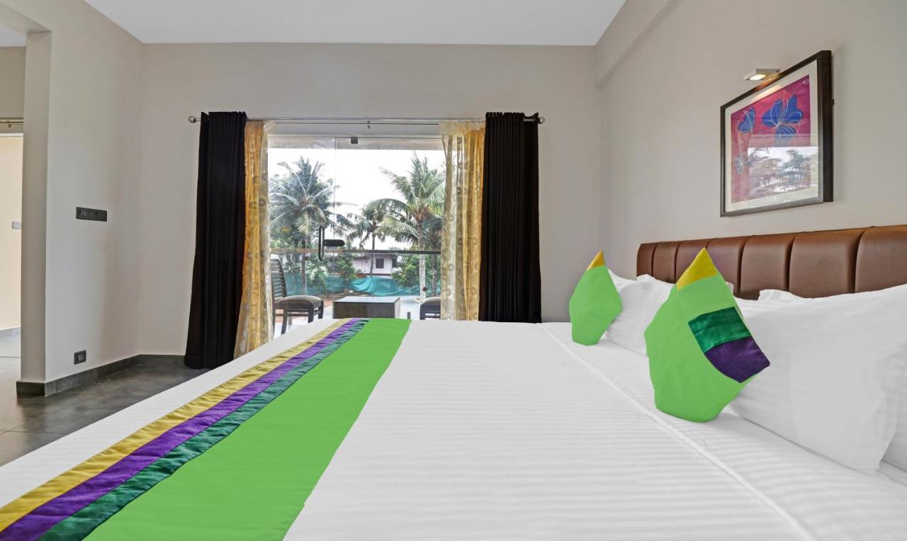 Treebo Grand Vistara Airport Suites Kochi Exterior foto